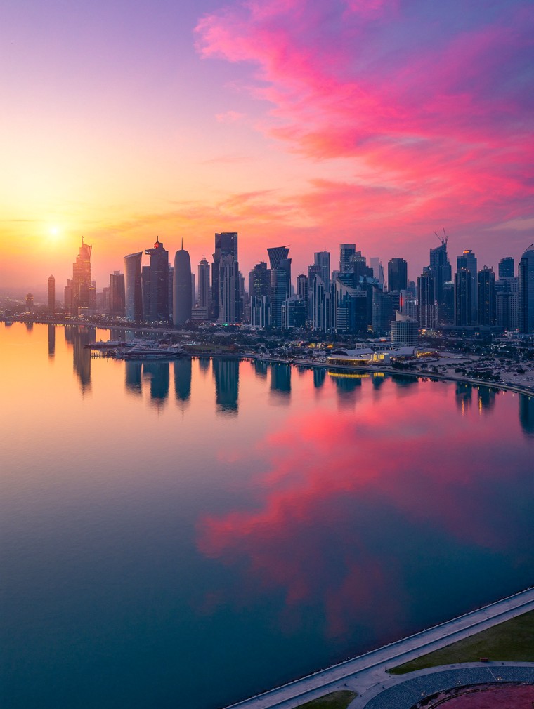 Doha skyline with J/70 fleet racing