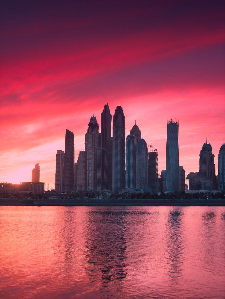 Dubai skyline with Burj Khalifa and J/70 fleet racing